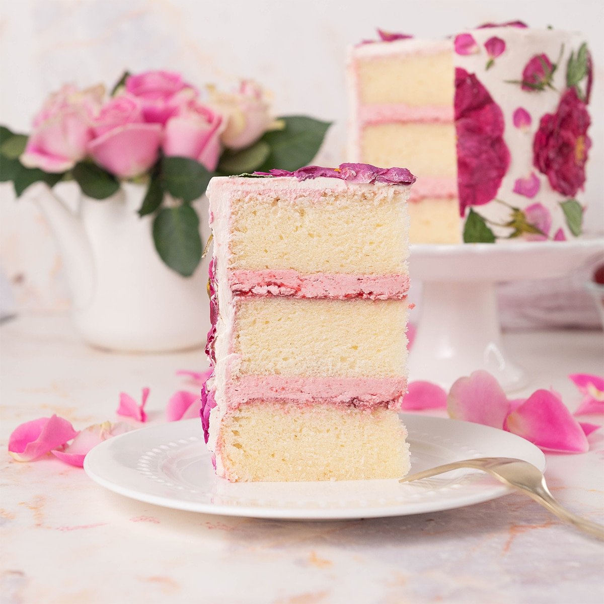 slice of rose cake on a plate