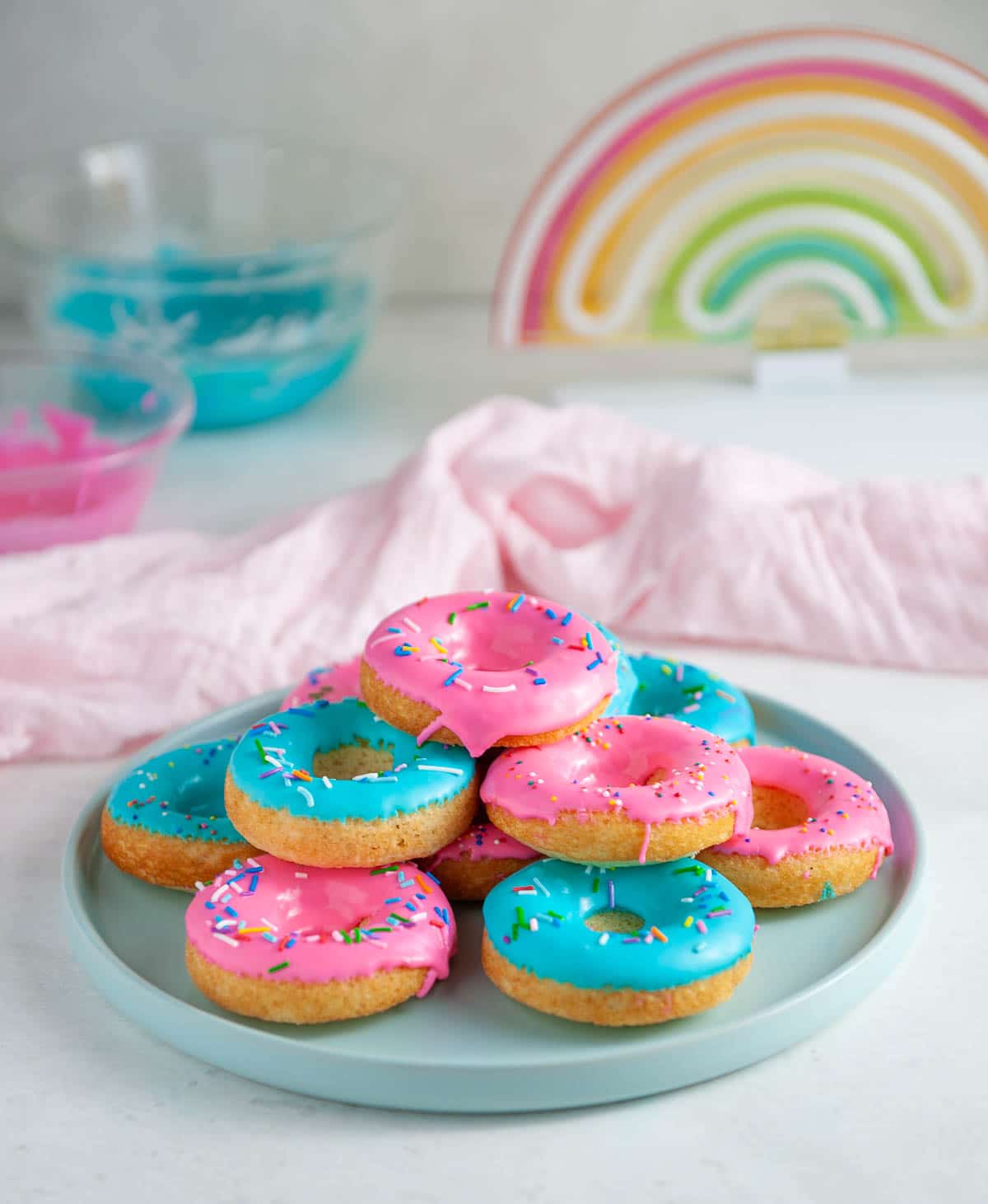 pink and blue donuts on a blue plate