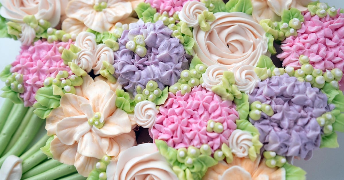 closeup of buttercream flower cupcakes
