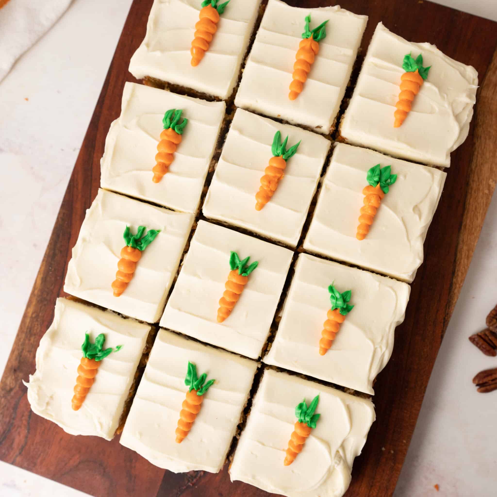 carrot cake bars on a cutting board