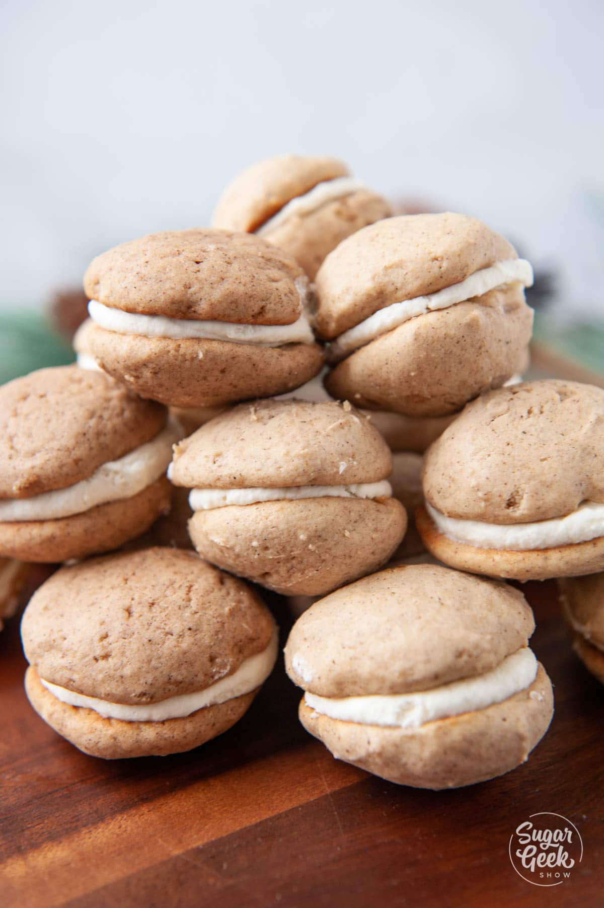 pile of chai whoopie pies on a wooden board
