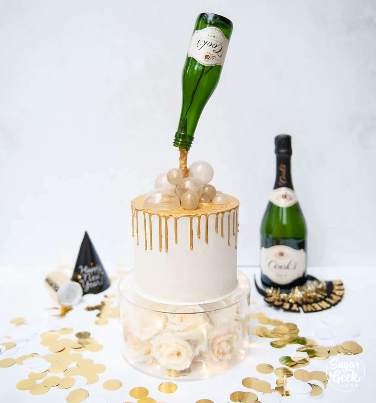 champagne cake with gravity defying bottle