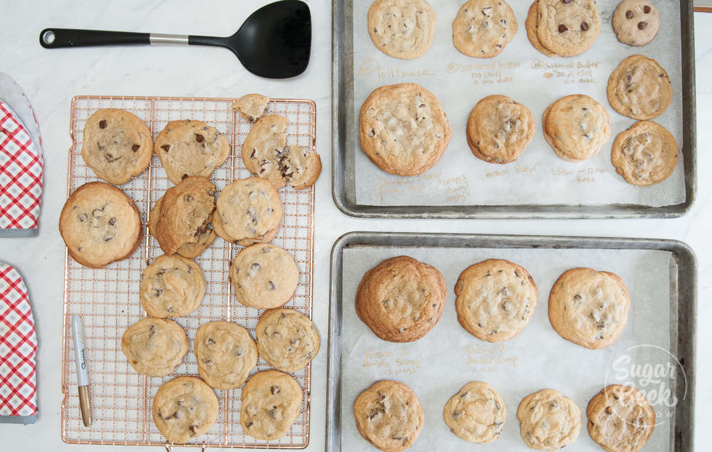 chocolate chip cookie tests on cookie sheets and cooling rack shot from above