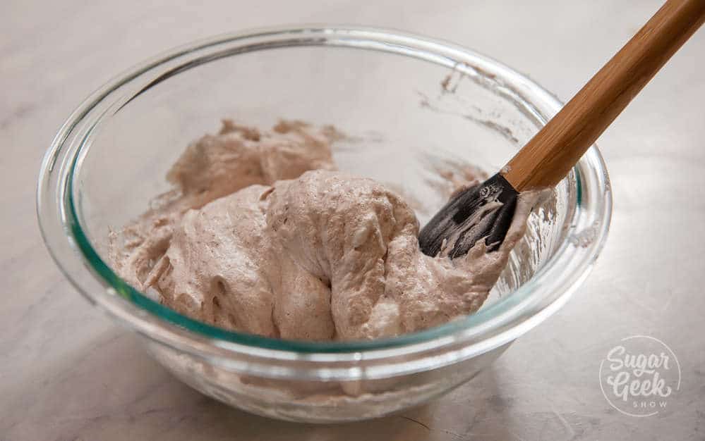 folding almond flour mixture into egg white mixture