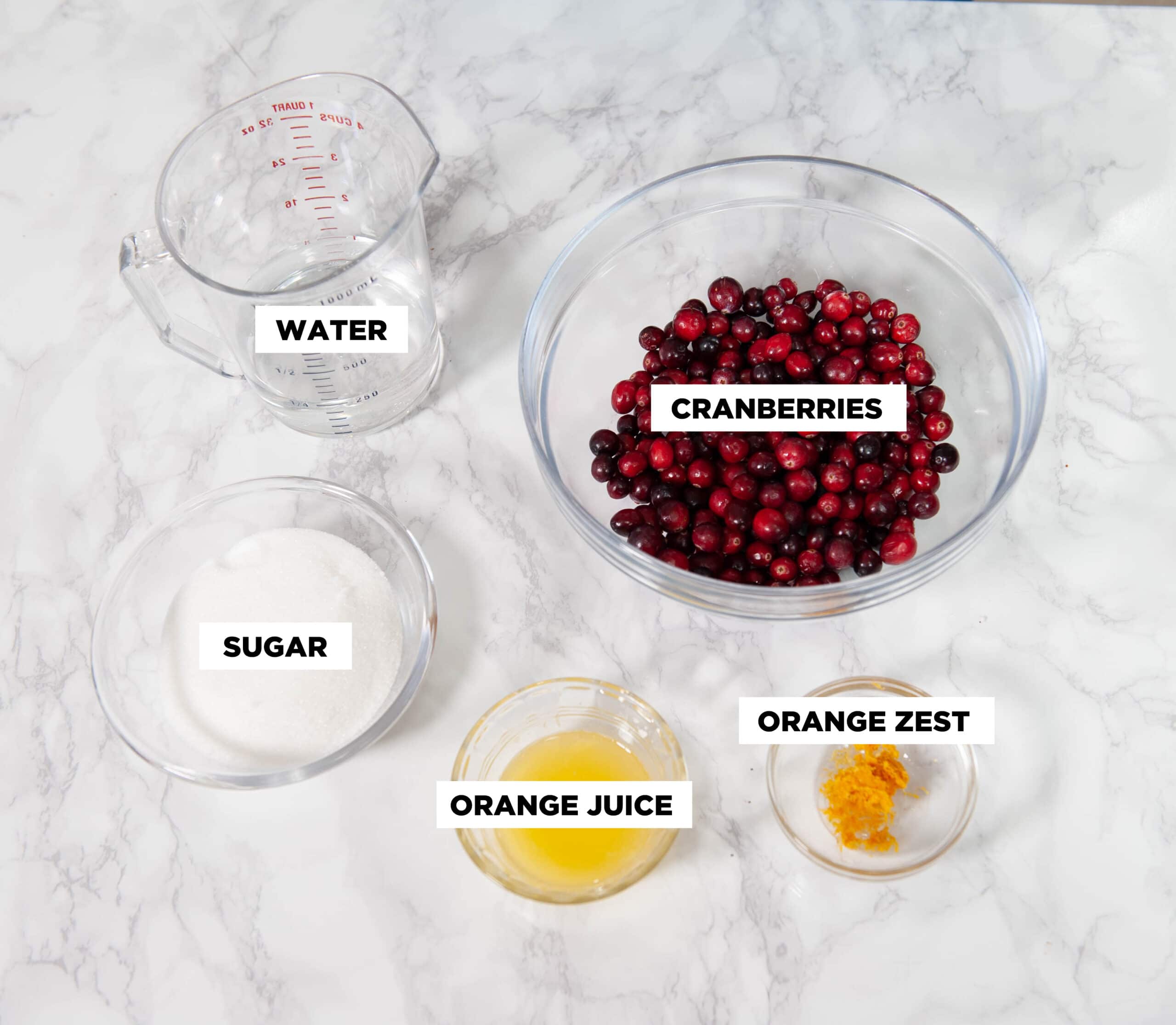 cranberry sauce ingredients in clear bowls