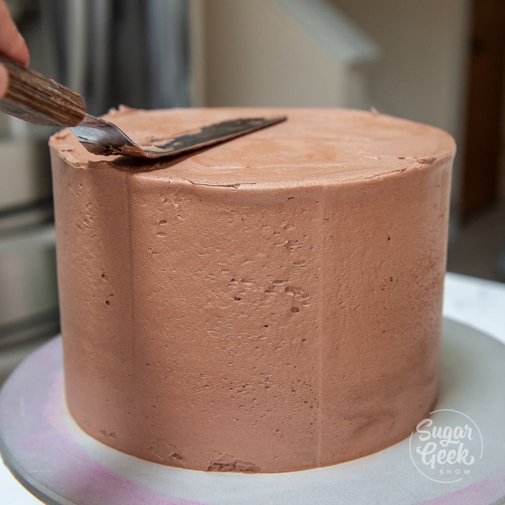 chocolate cake with offset spatula
