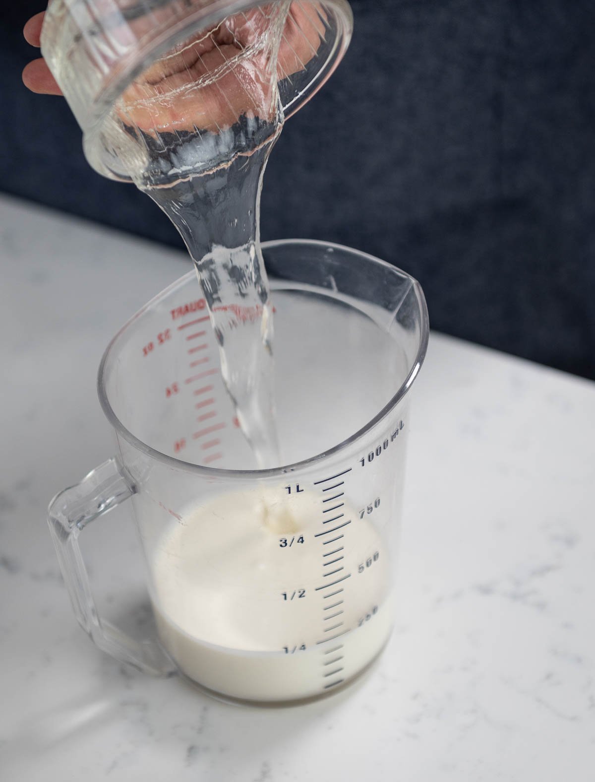 pouring mixture into pitcher
