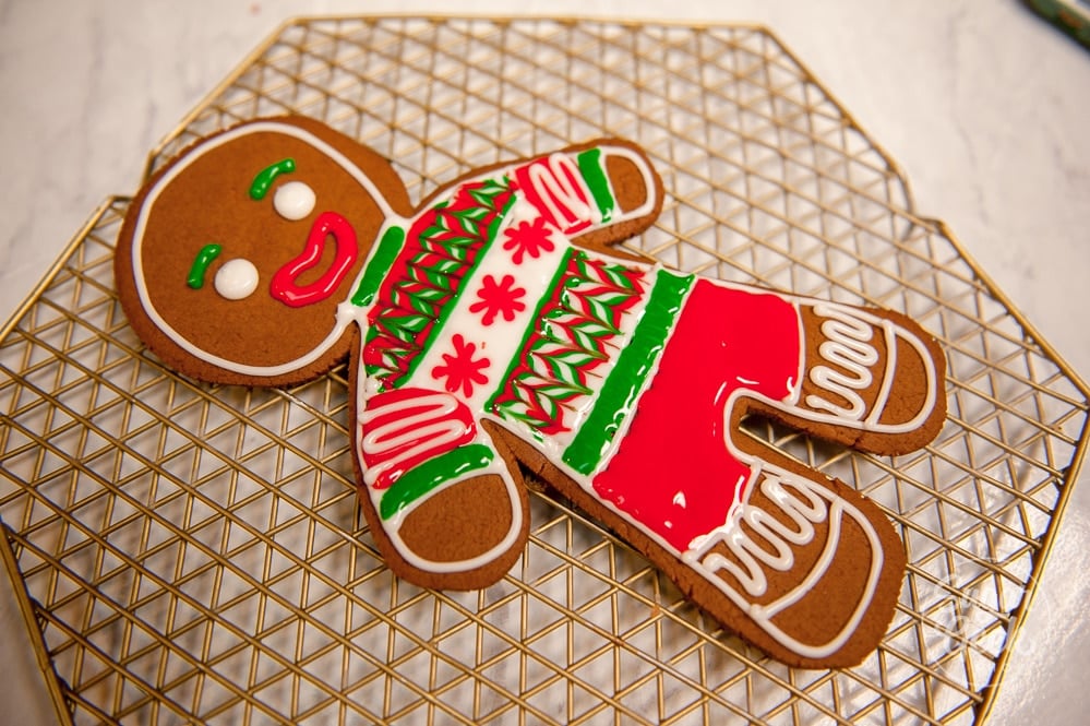 giant gingerbread man cookie with ugly sweater