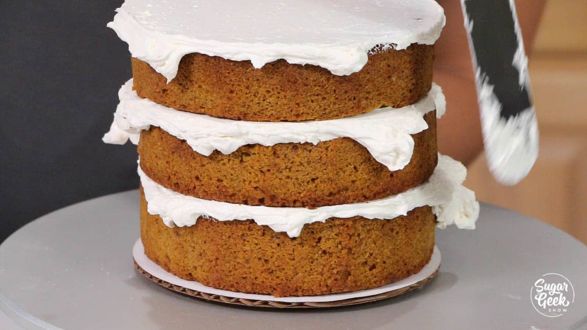 pumpkin cake stacked with buttercream