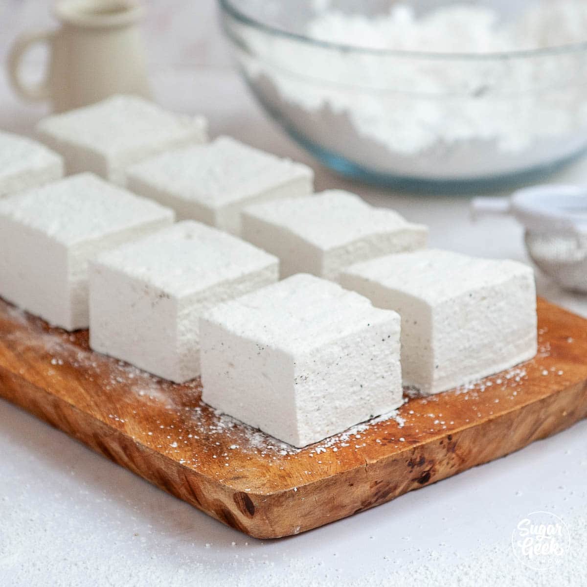 closeup of cut homemade marshmallows on a cutting board