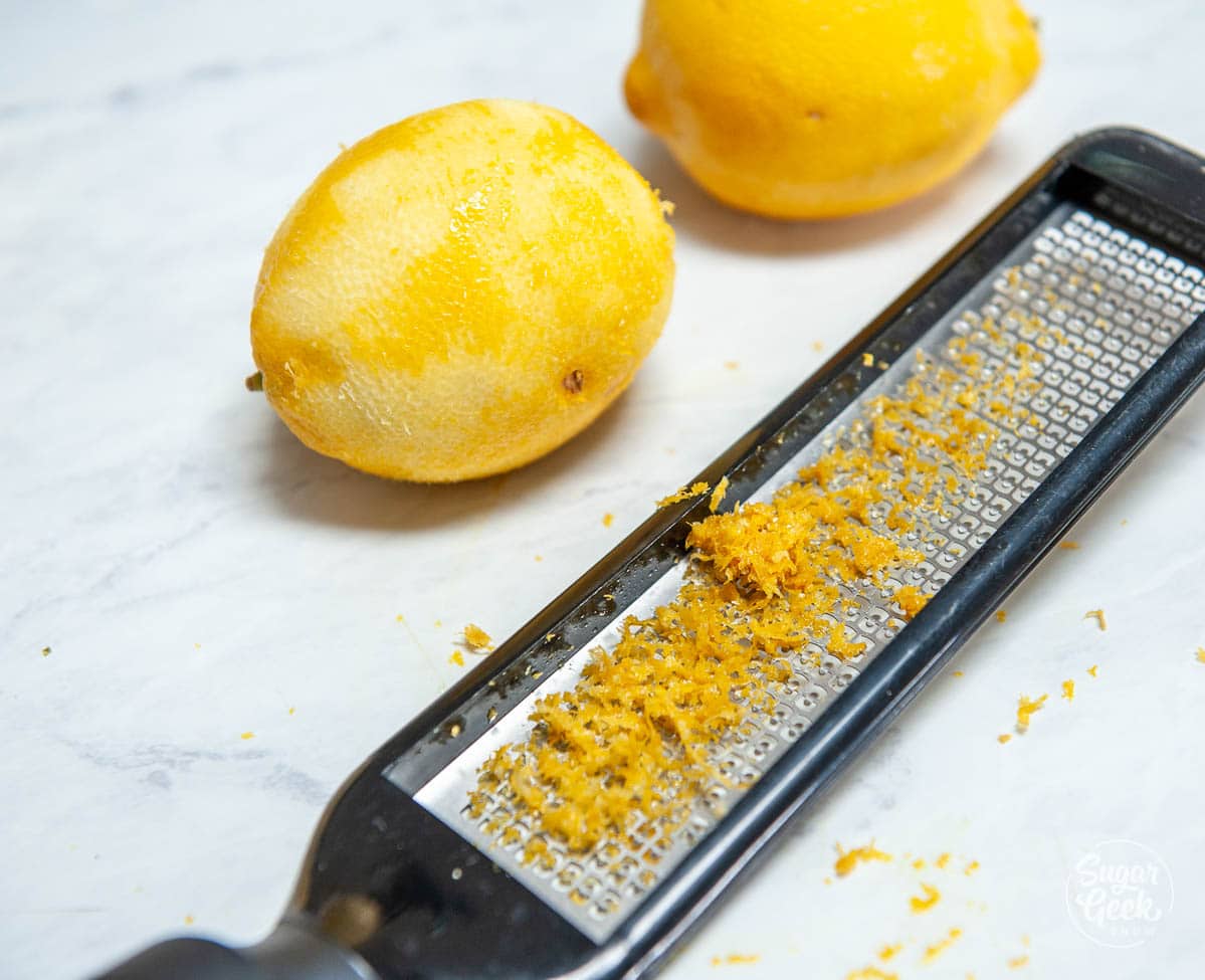 close up of lemon zest on a microplane