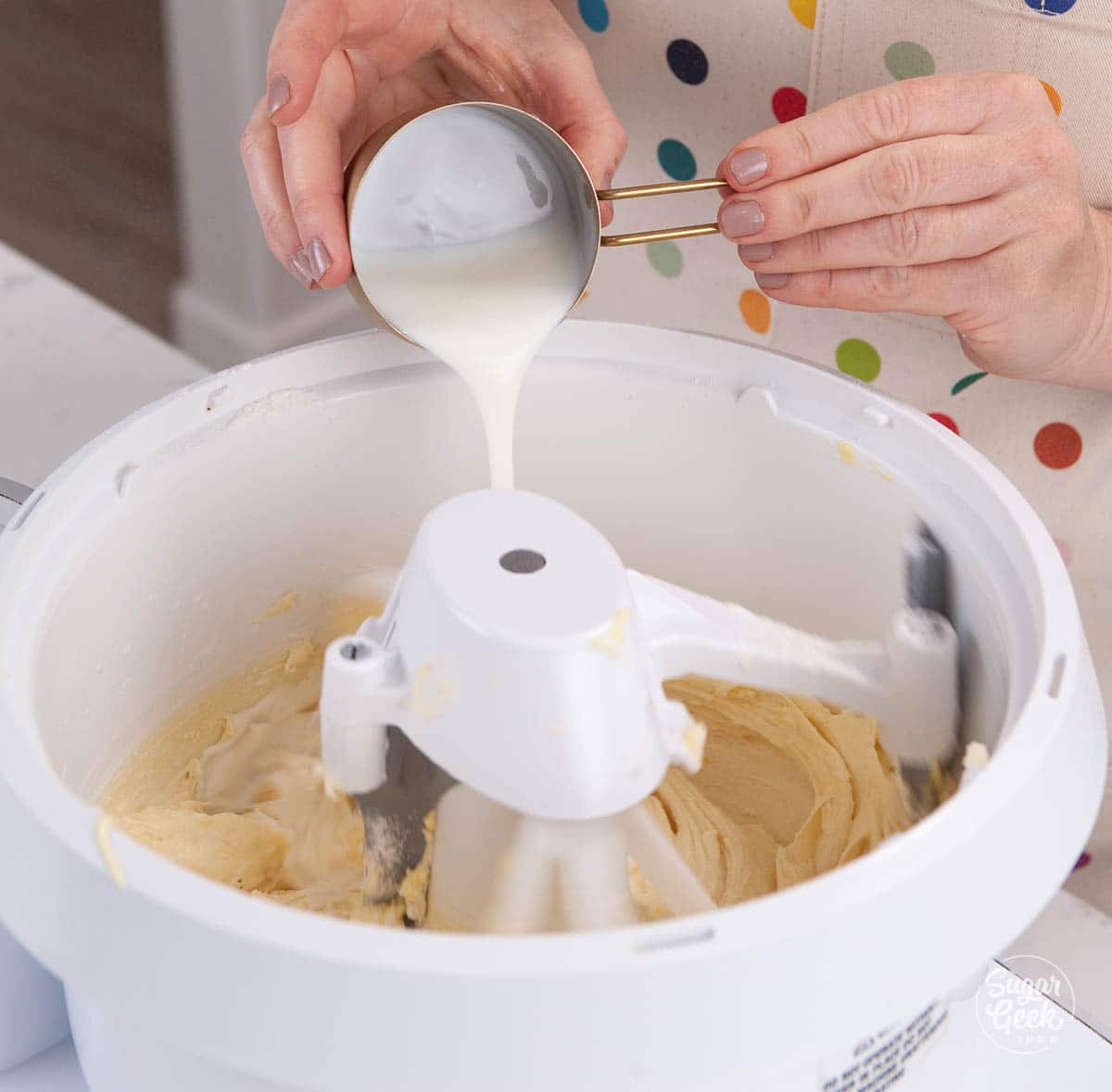 adding buttermilk to mixing bowl