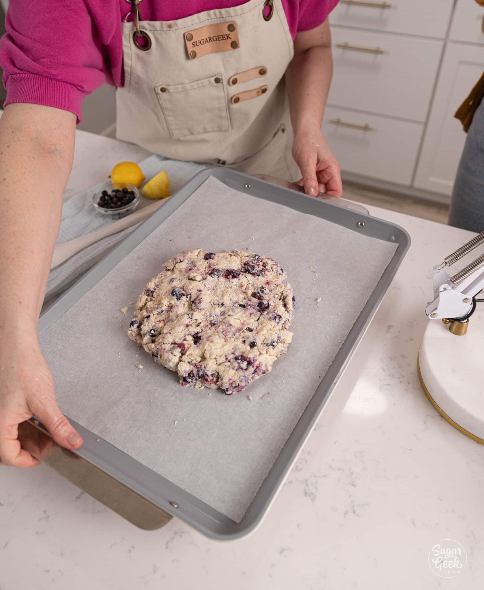 8" mound of scone dough on a sheet pan