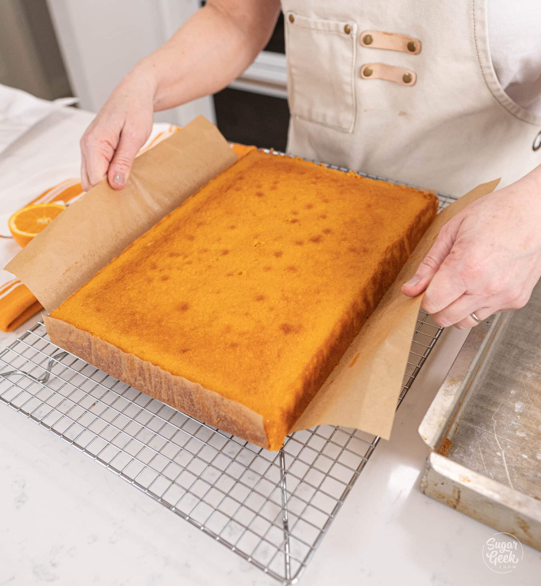 placing a cake on a cooling rack
