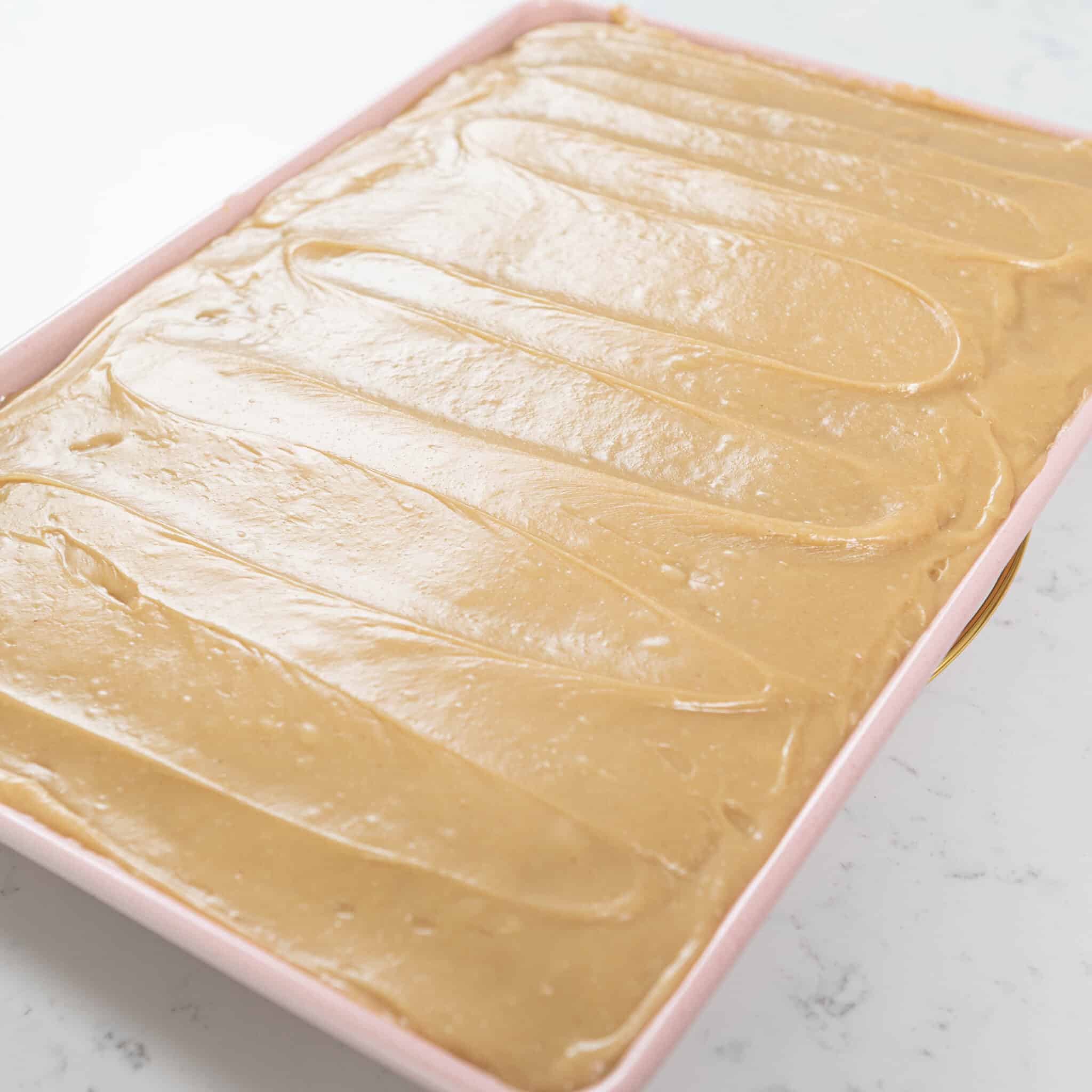 peanut butter texas sheet cake in a pink pan