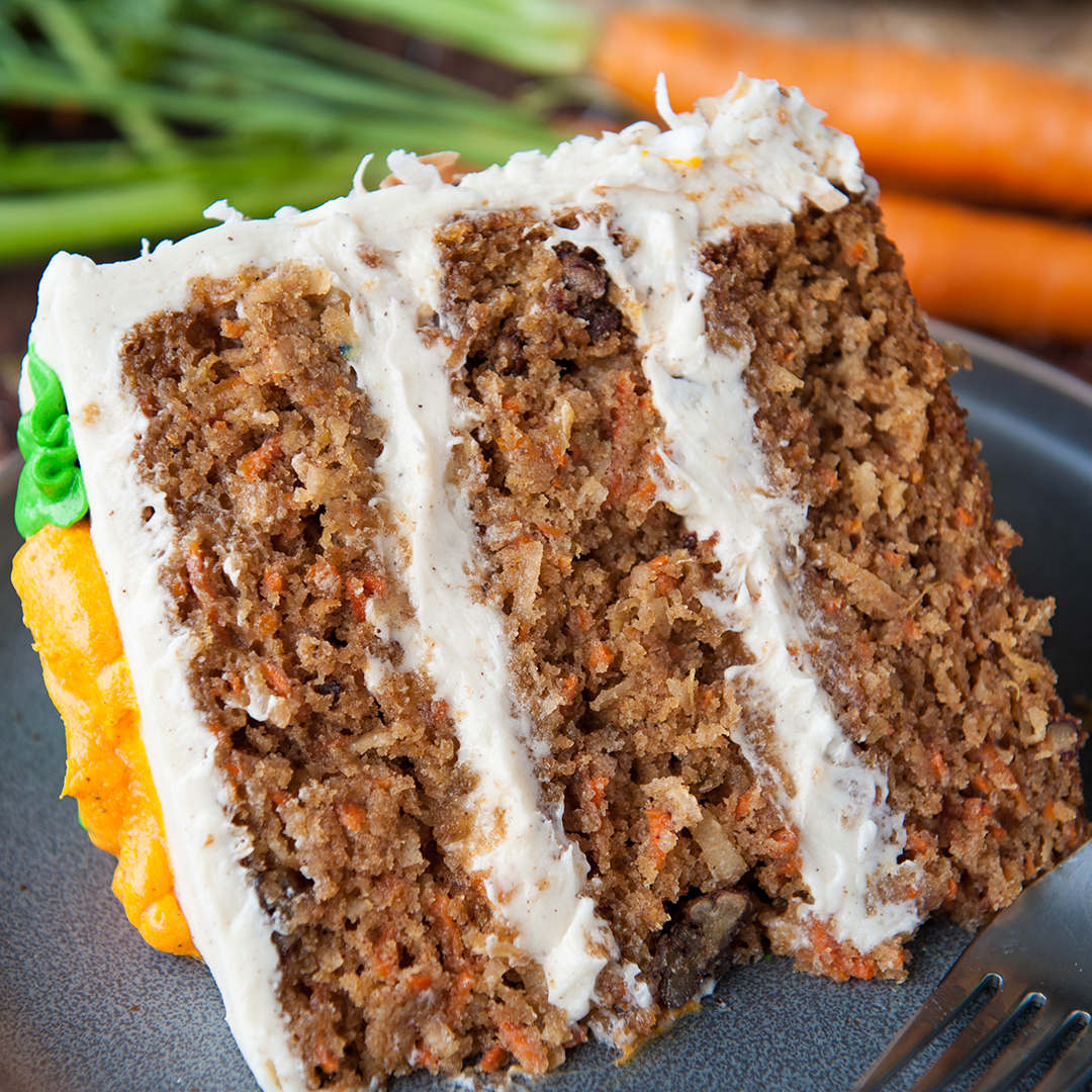 Moist carrot cake with pineapple, toasted coconut, candied pecans and big chunks of carrots. Frosted with brown butter cream cheese frosting
