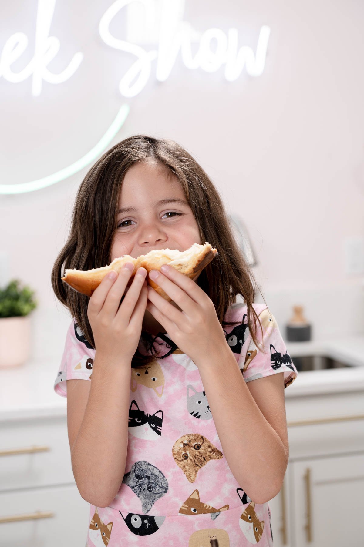 little girl eating bread