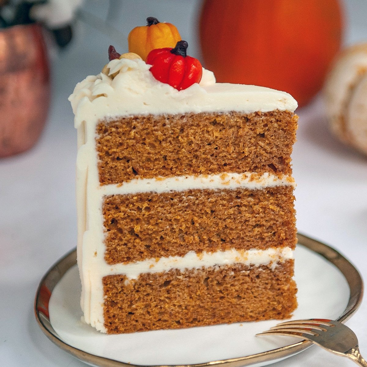 closeup of pumpkin spice cake on a white plate