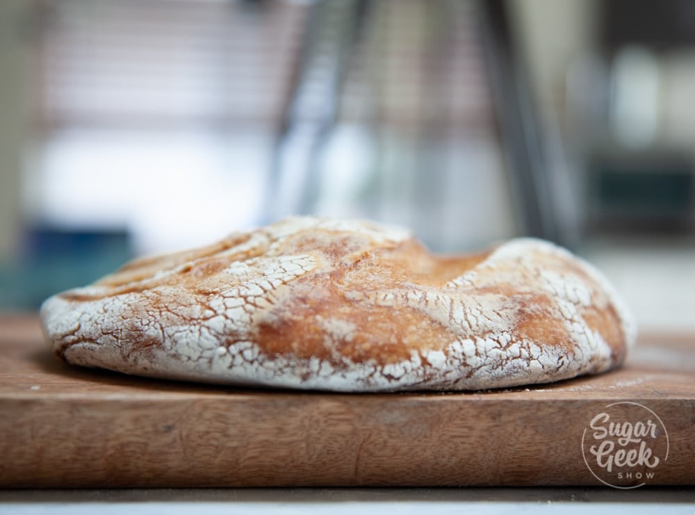 flat loaf of sourdough bread