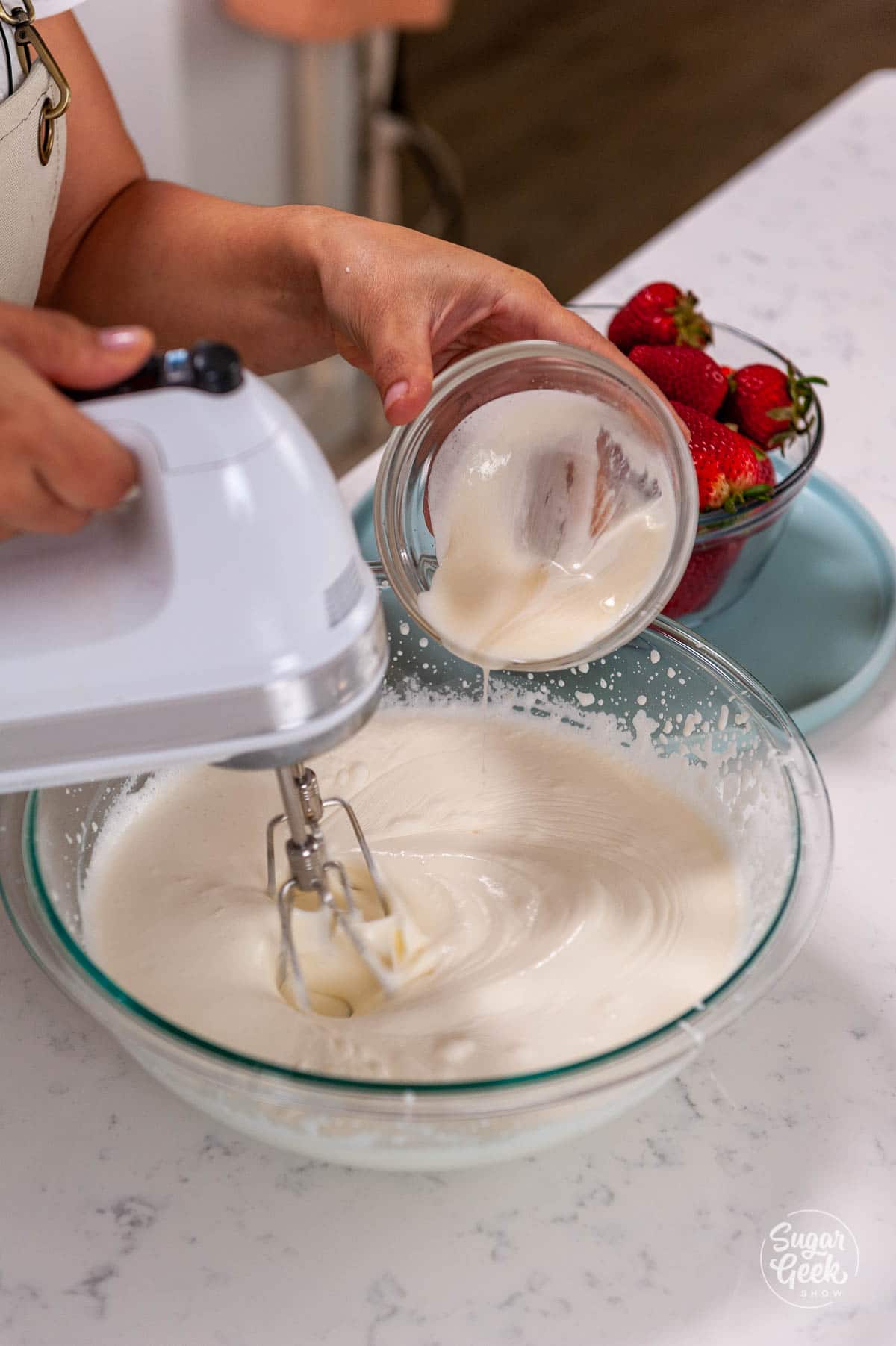 adding gelatin mixture to thickened whipped cream