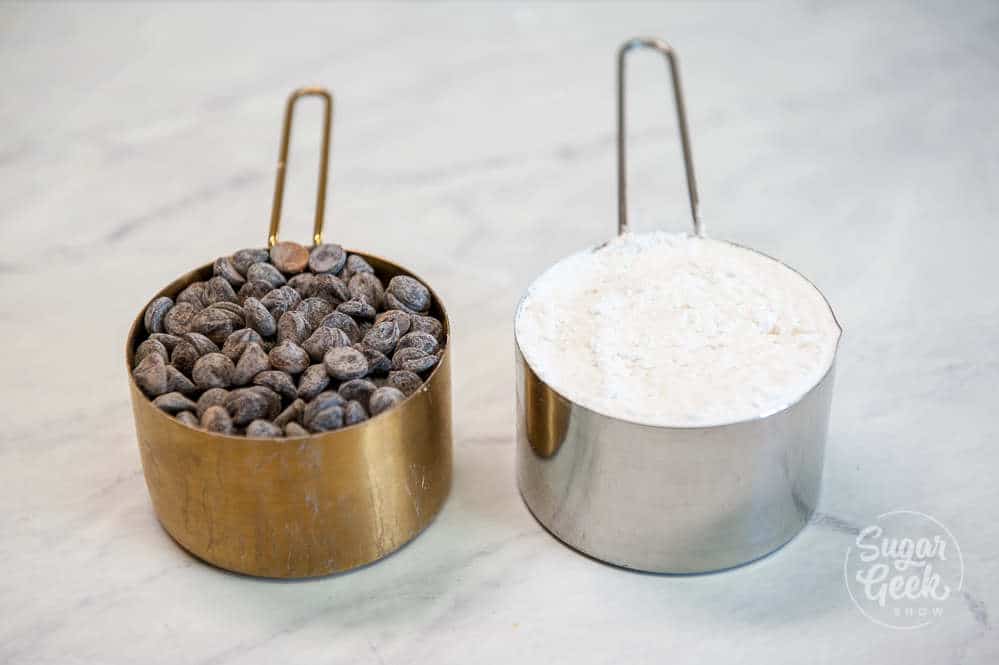 one cup of chocolate chips and one cup of flour side by side