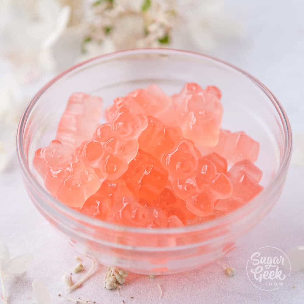 rose wine gummy bears in a glass bowl