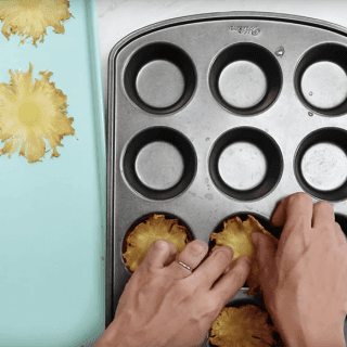 Place warm slices into a cupcake tin until cool and the pineapple slices can hold their shape